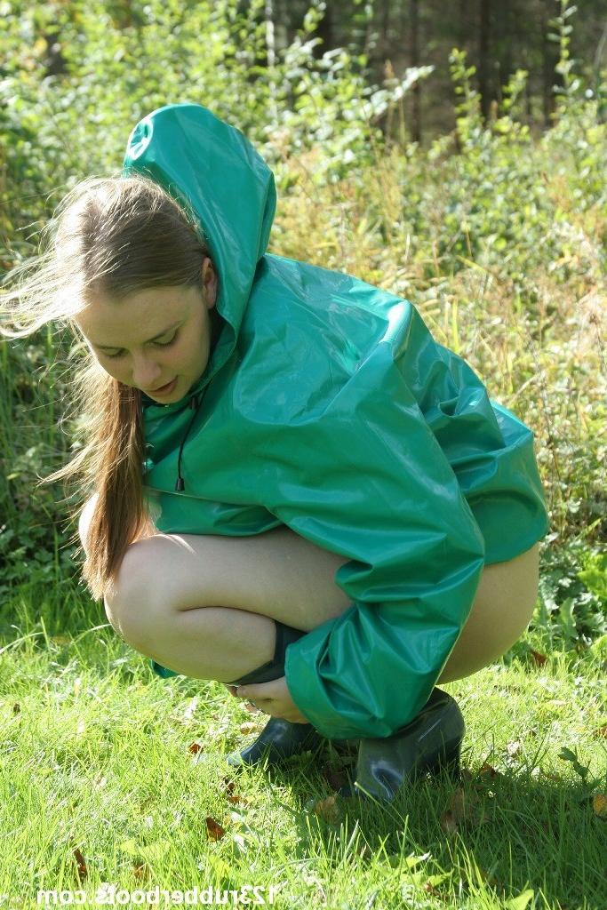 20P Rainwear and rubber boots fetish with wet pussy outdoors