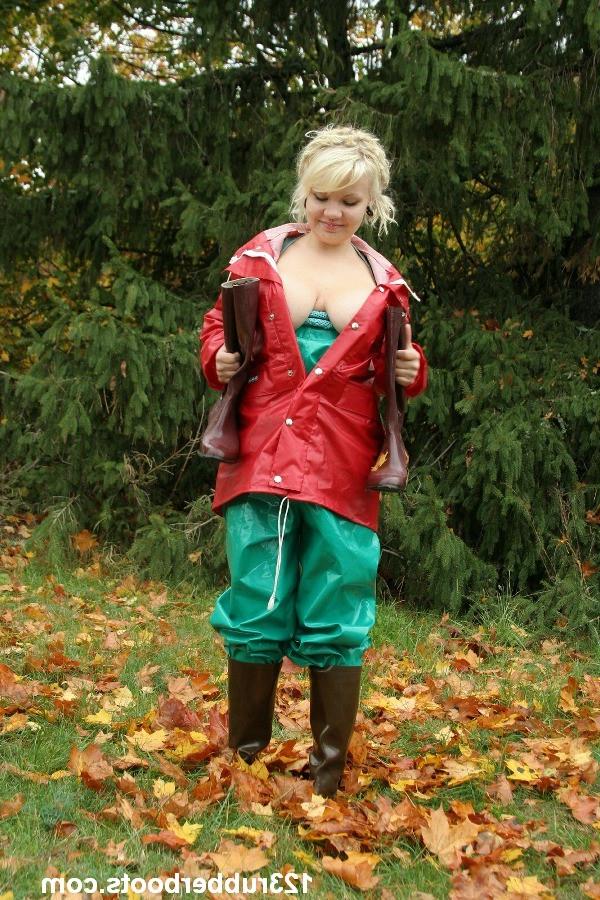 20P Big boobs girl in rubber rainwear fetish fun outdoors.