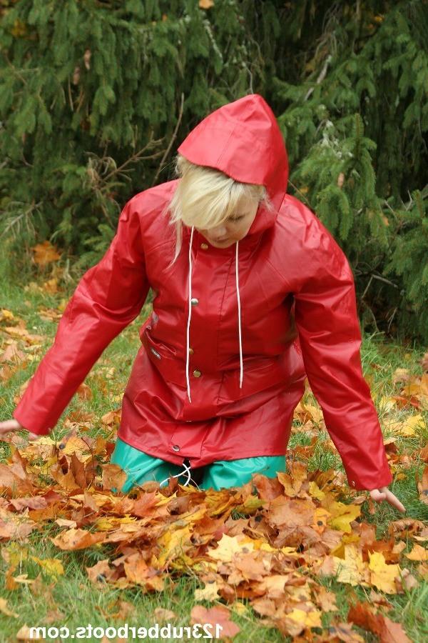 20P Big boobs girl in rubber rainwear fetish fun outdoors.