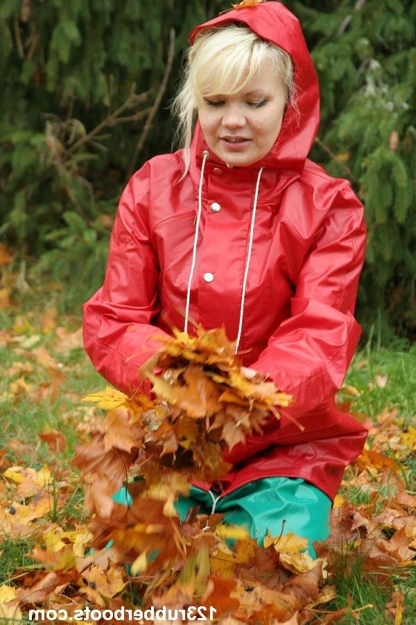 20P Big boobs girl in rubber rainwear fetish fun outdoors.