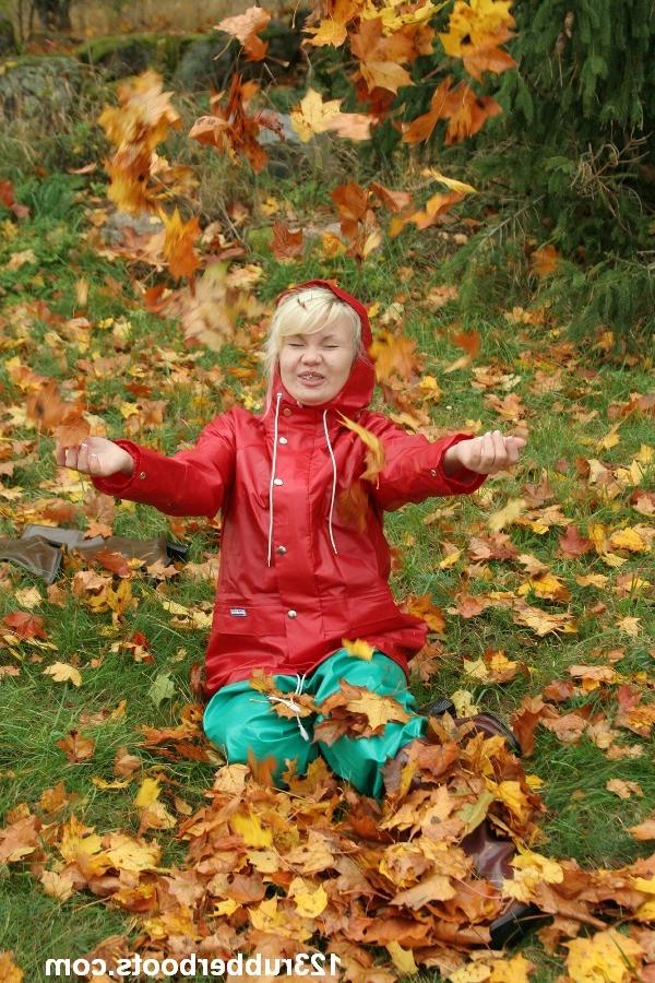 20P Big boobs girl in rubber rainwear fetish fun outdoors.