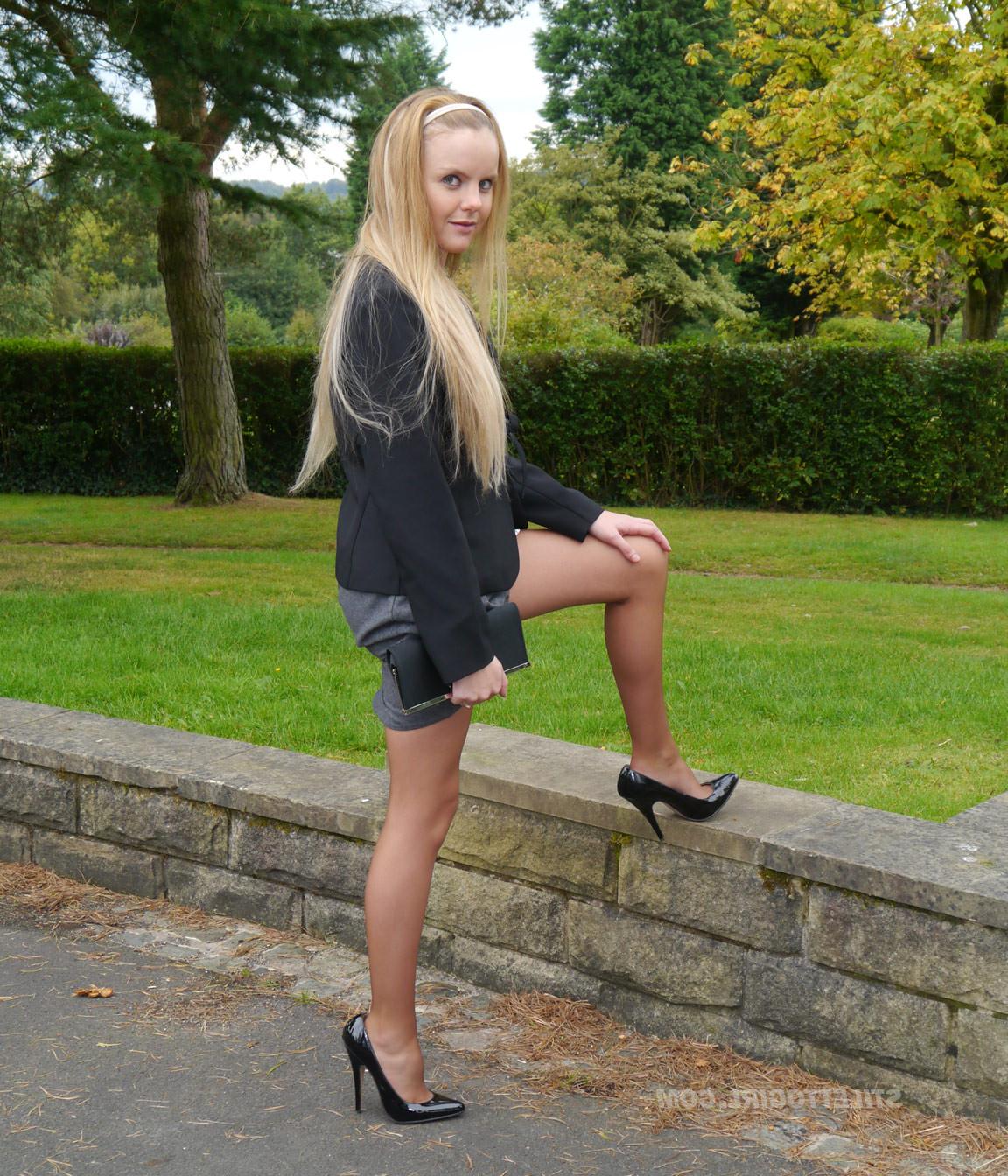 16P Cute blonde is outdoors in tall black high heel shoes and sexy n