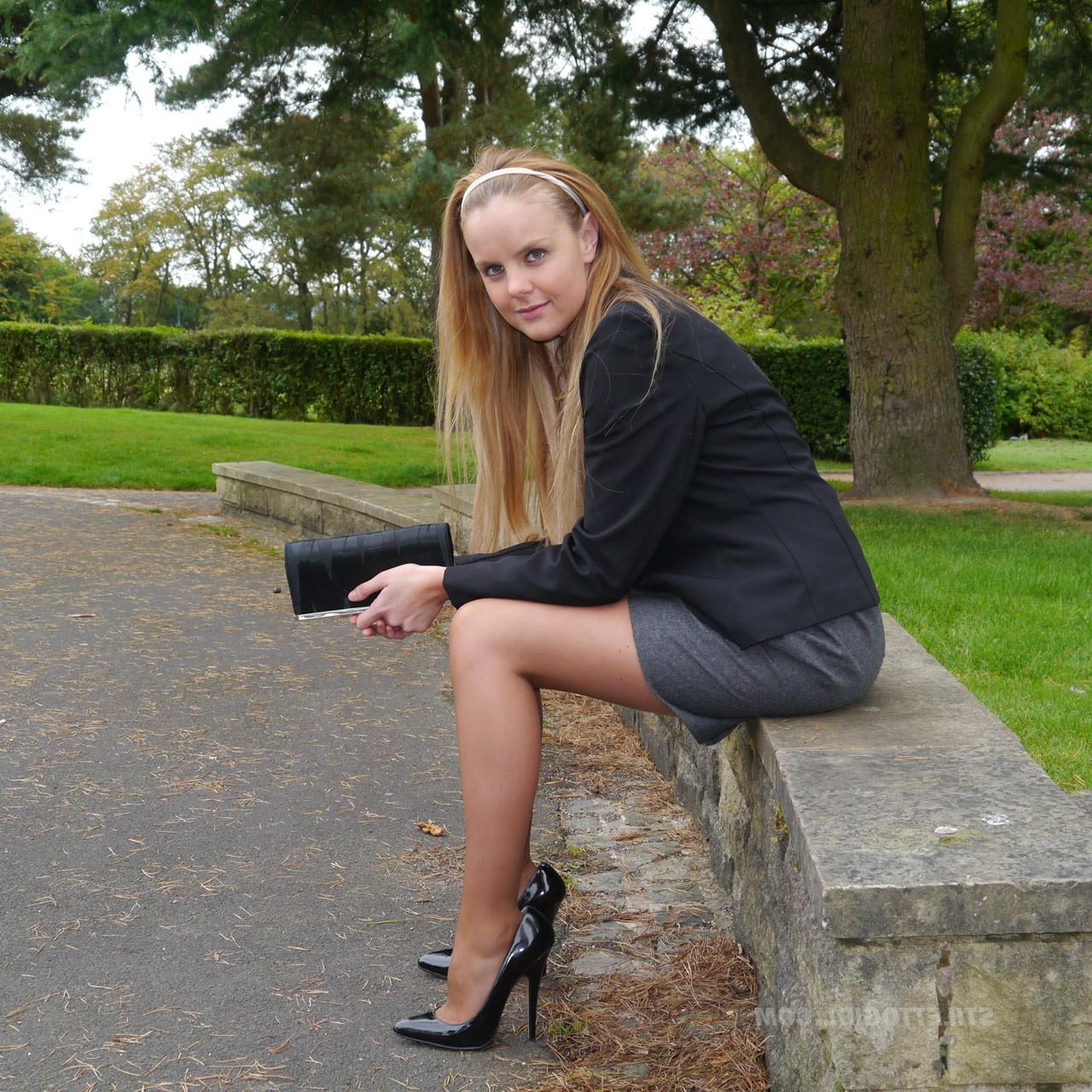 16P Cute blonde is outdoors in tall black high heel shoes and sexy n