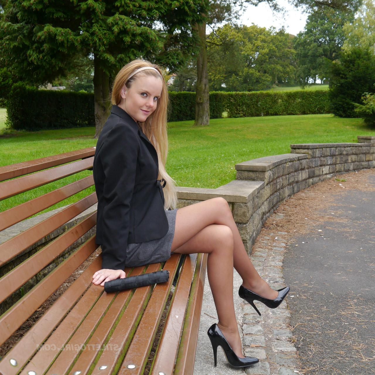 16P Cute blonde is outdoors in tall black high heel shoes and sexy n