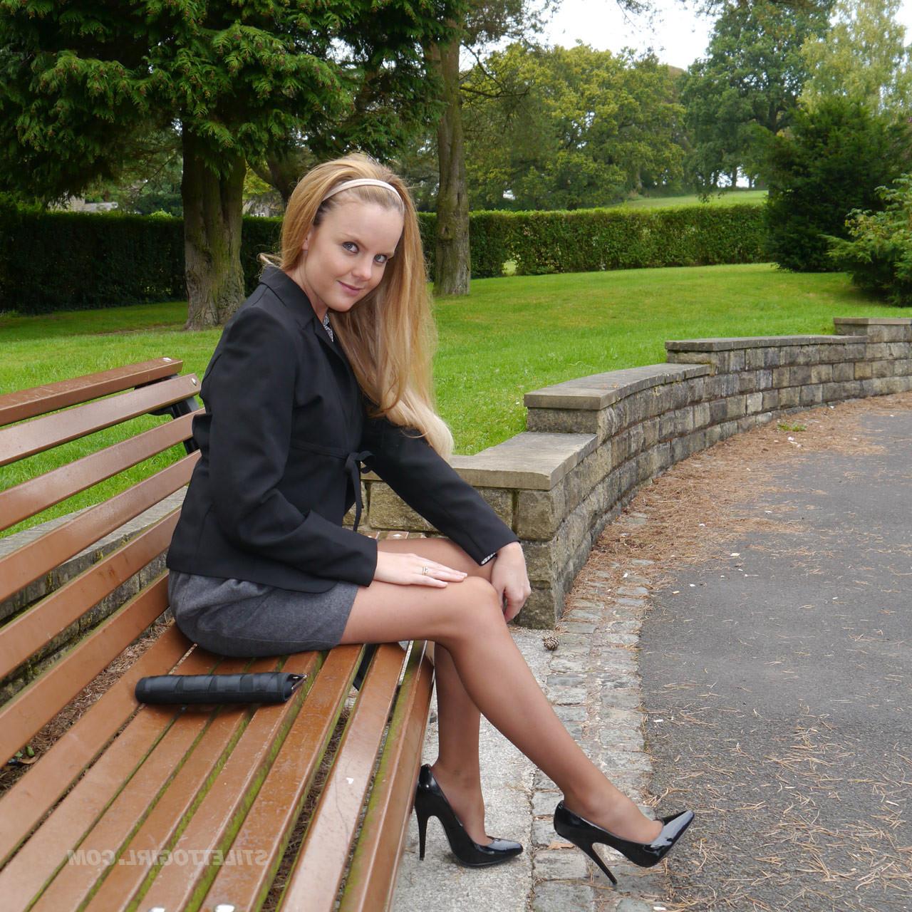 16P Cute blonde is outdoors in tall black high heel shoes and sexy n