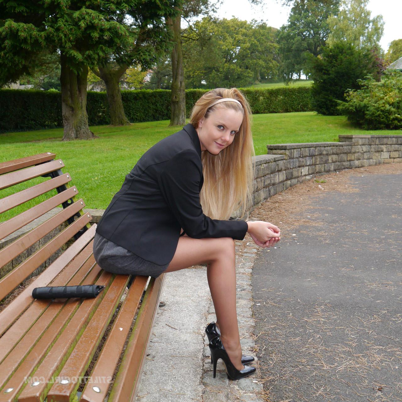 16P Cute blonde is outdoors in tall black high heel shoes and sexy n