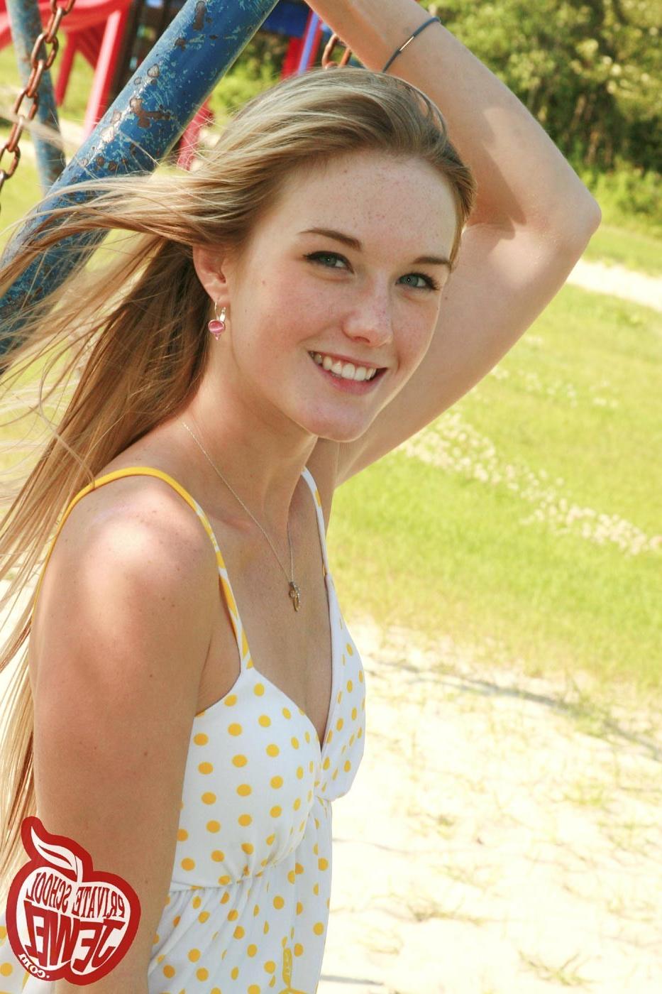16P Cute blonde teen girl swinging outdoors