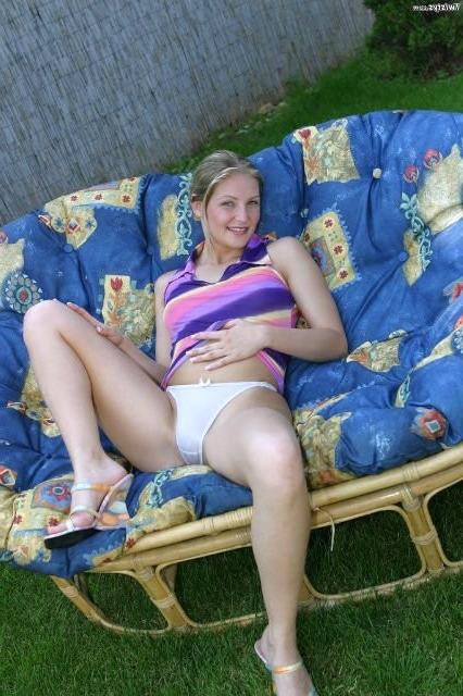 16P Sweet blonde babe posing outdoors