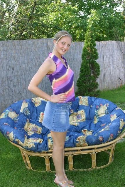 16P Sweet blonde babe posing outdoors