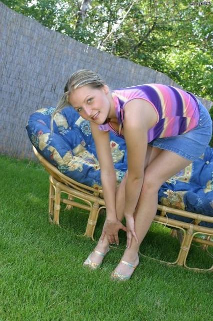 16P Sweet blonde babe posing outdoors