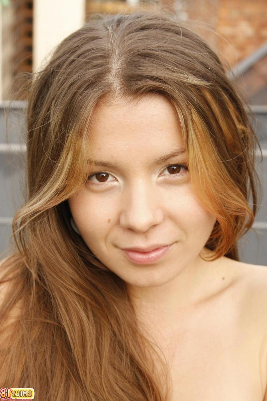 16P Cute teen girl Emily outdoors on roof