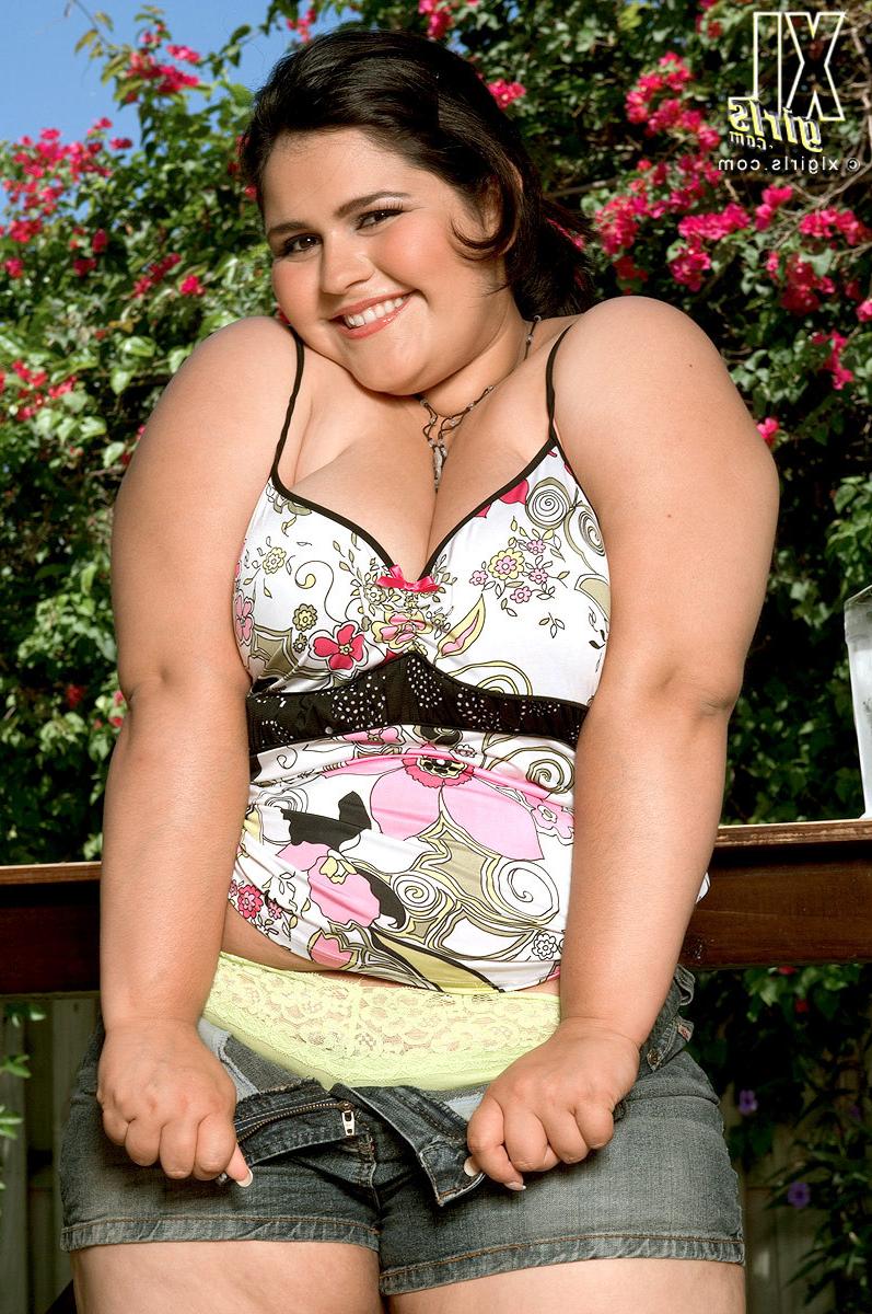 16P Beautiful chubby brunette outdoors with huge natural breasts posing