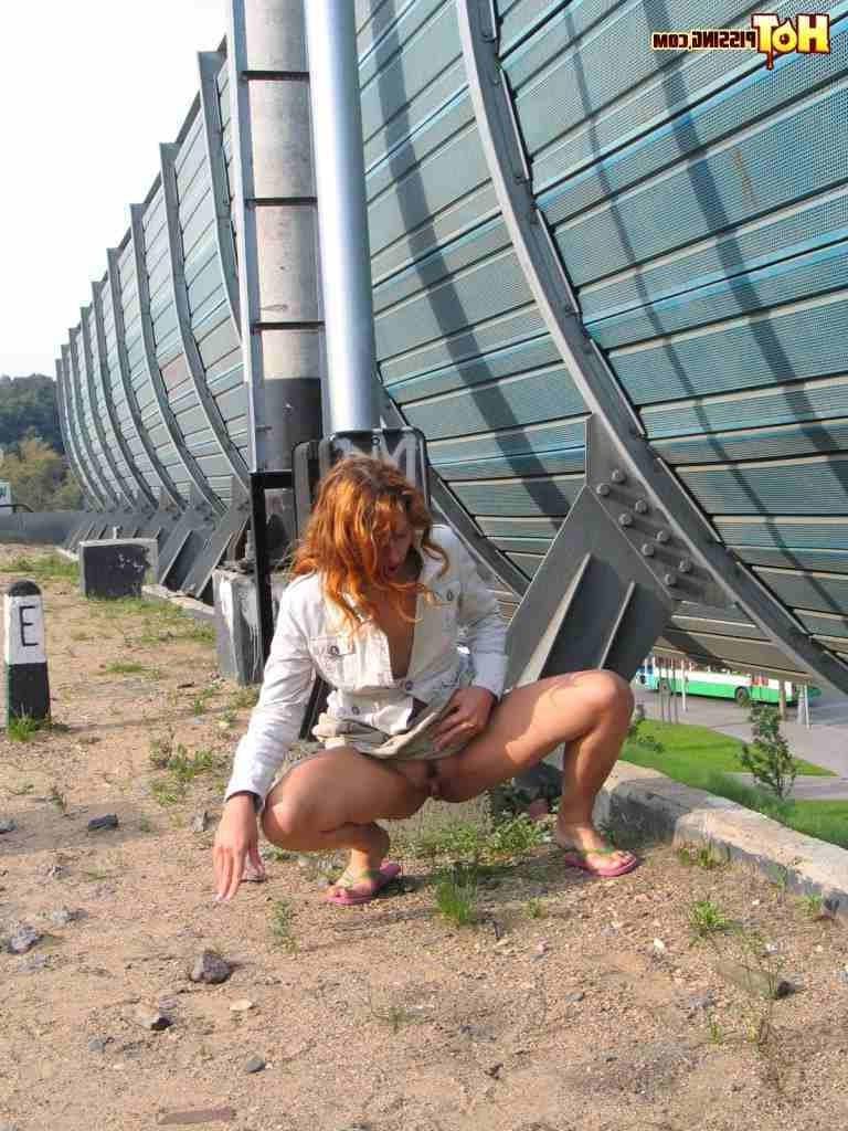 16P Redhead pissing outdoors