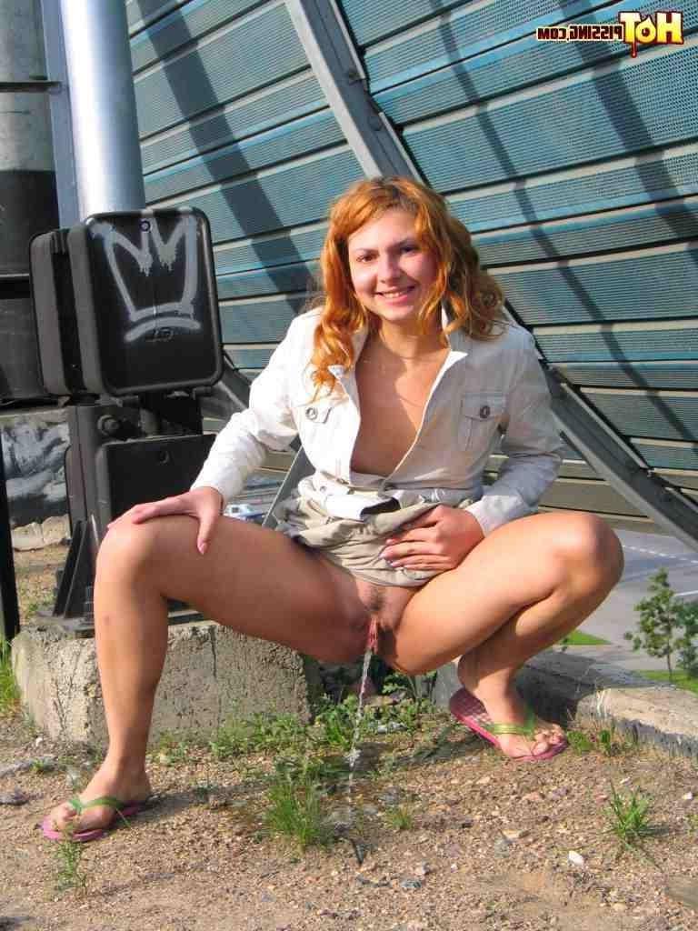 16P Redhead pissing outdoors