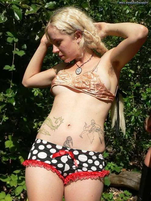15P Puffy Nippled Nudist Bares Her Tattooes Outdoors in the Forest