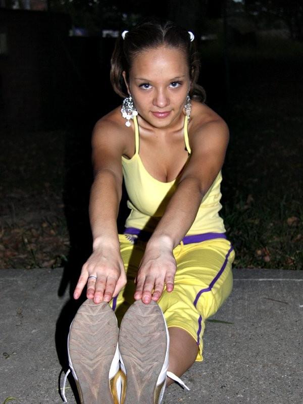 16P Sexy hispanic teen Paris Milan stretching outdoors