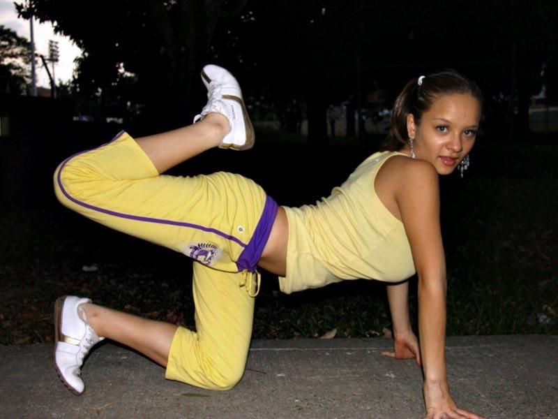 16P Sexy hispanic teen Paris Milan stretching outdoors