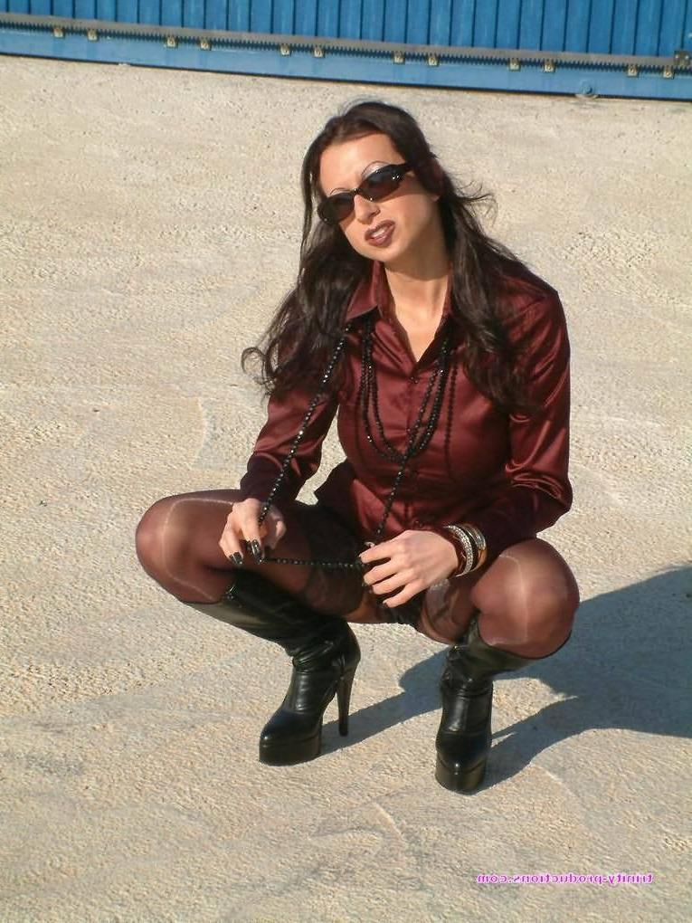12P Trinity in boots and stockings outdoors
