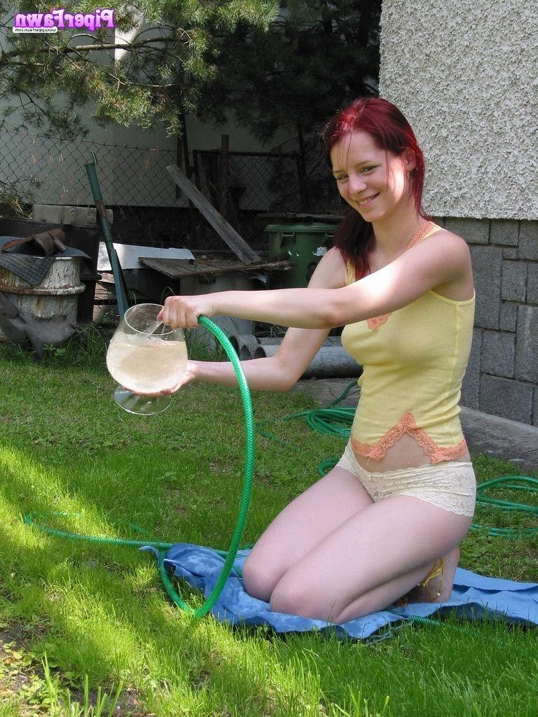 16P Busty redhead teen gets wet outdoors