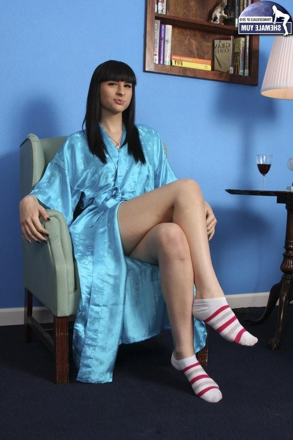 15P Alluring Shemale Bailey Jay Disrobes And Strokes Her Cock