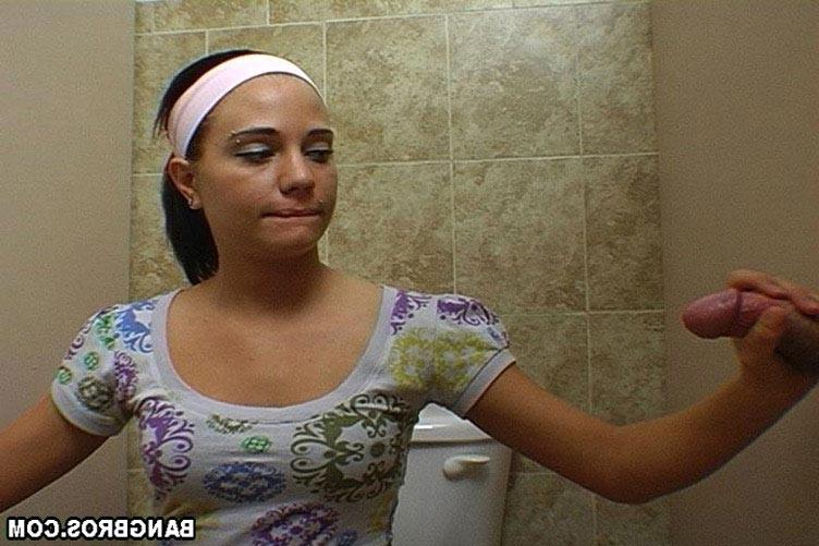 17P Amateur teen Brandi Belle gives handjob at the glory hole