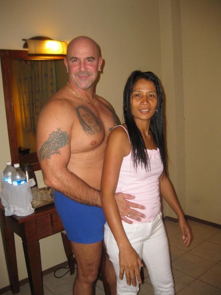12P My wife getting unwrapped by  a total stranger.