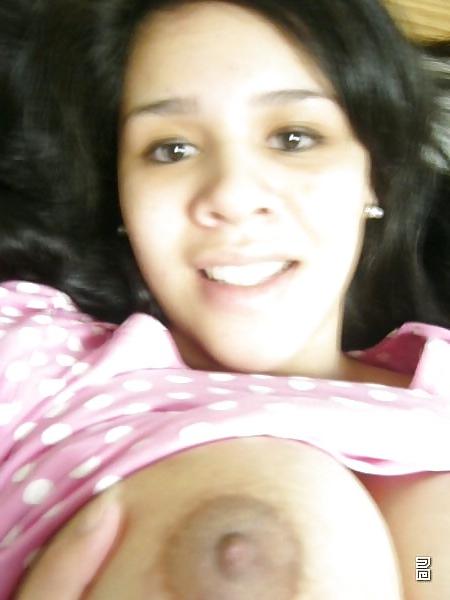 16P Latin amateur teen with big tits in close-up.