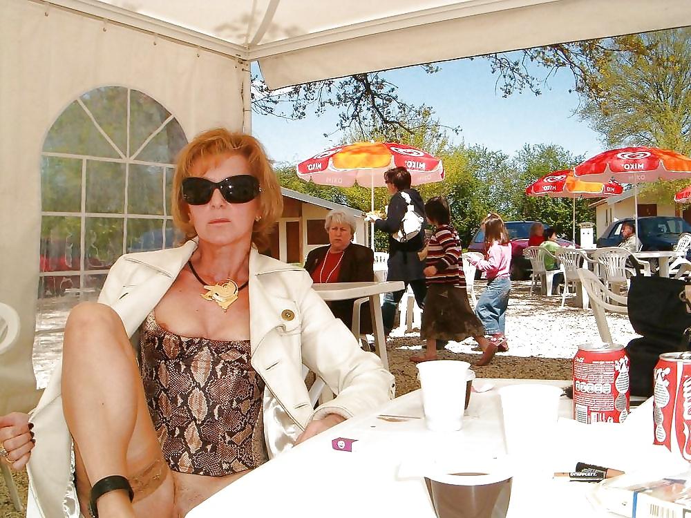 8P Amateur mature redhead Monique pussy flashing.
