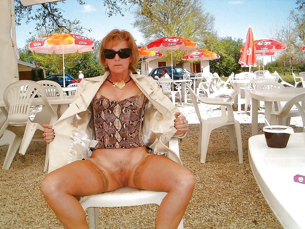 8P Amateur mature redhead Monique pussy flashing.