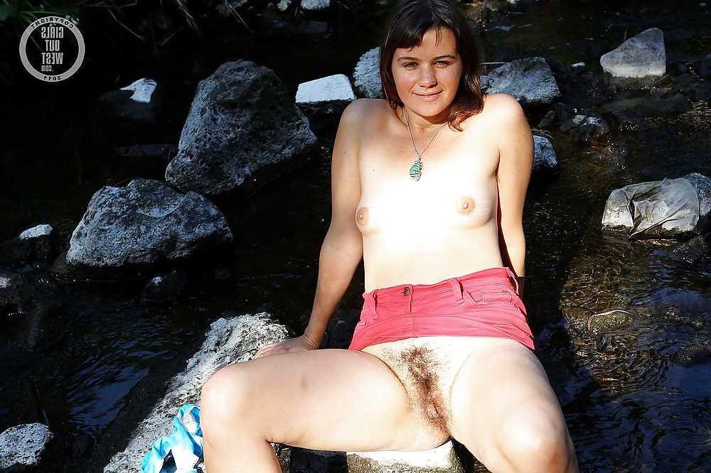 16P Small titted amateur spreads her hairy pussy in the river