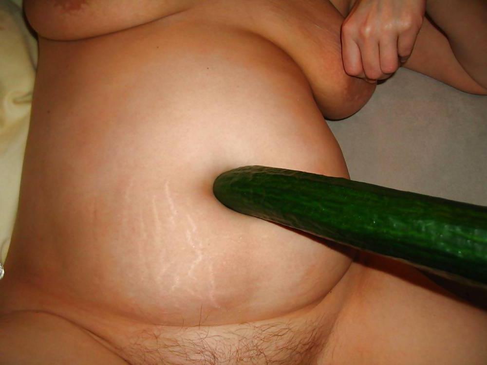 23P German amateur working out with a cucumber
