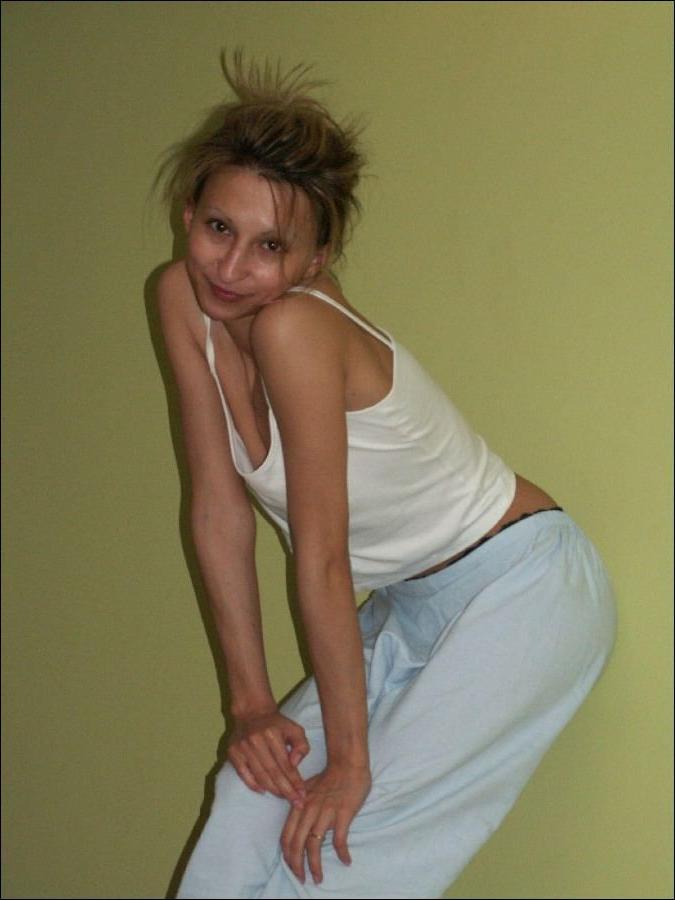 16P Slim and skanky-looking amateur poses topless in different places and sucks on a