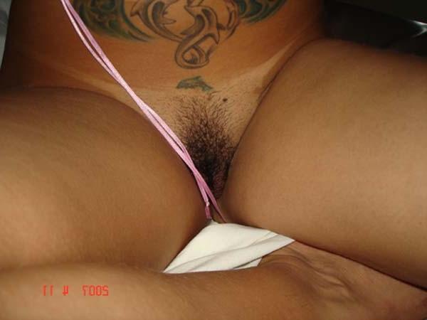 16P Horny Latina named Maria bares her titties pussy in bed for the camera then suck