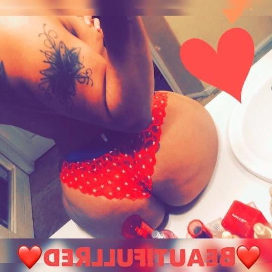 24P Red Skinned American Woman