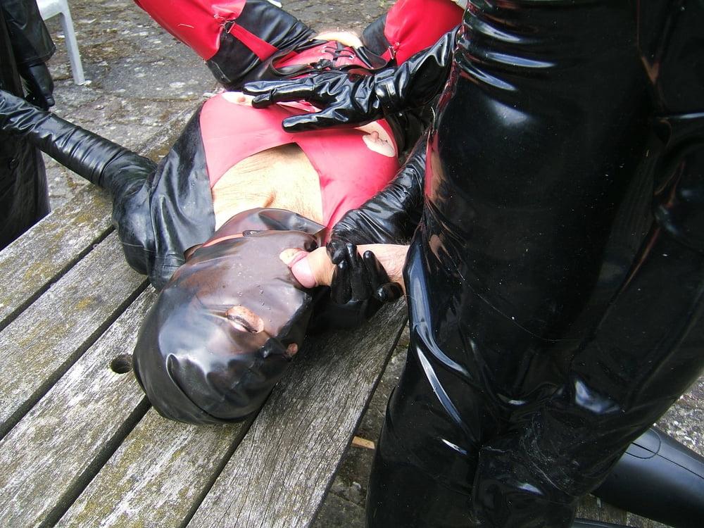 25P Rubber granny plays with some cocks