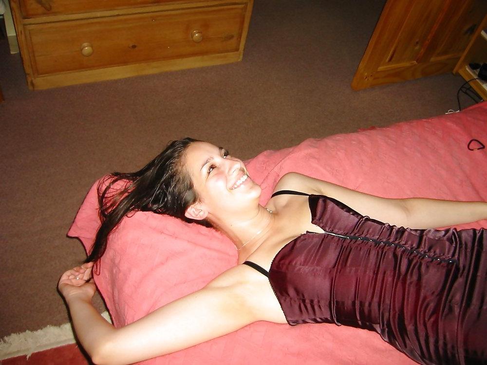 13P Amateur brunette posing in her bedroom