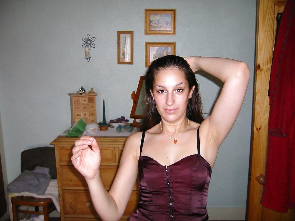13P Amateur brunette posing in her bedroom