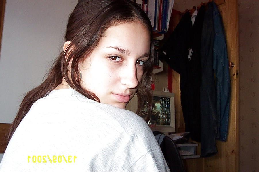 13P Amateur brunette posing in her bedroom