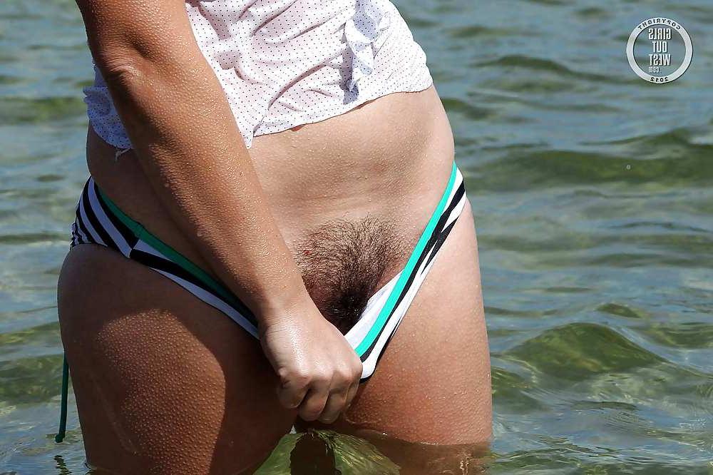 16P Busty hairy amateur in the sea