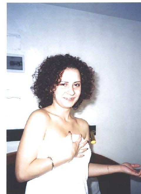 16P Curly brunette amateur Tania posing