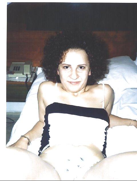 16P Curly brunette amateur Tania posing