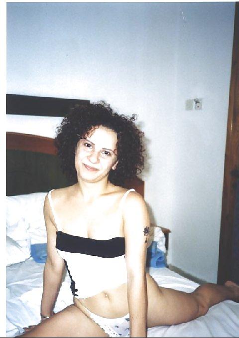 16P Curly brunette amateur Tania posing