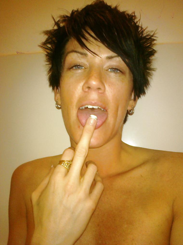 15P Sexy Short Haired Brunette Amateur Posing