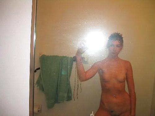 9P Amateur blonde posing and fingering her hole