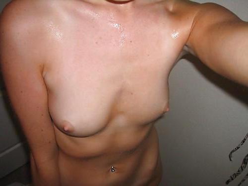 9P Amateur blonde posing and fingering her hole