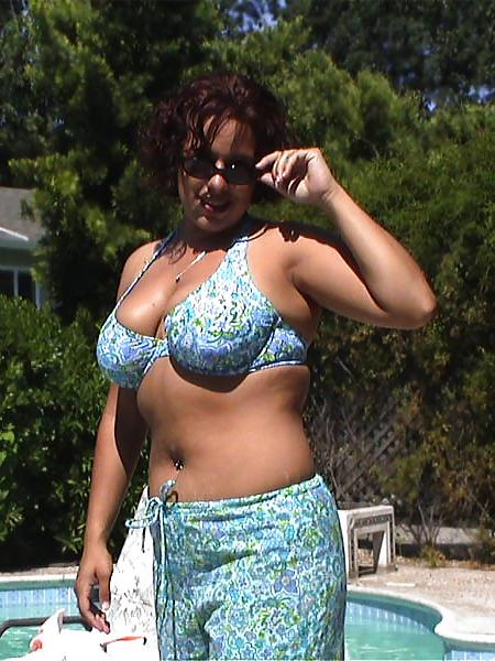 14P Buxom brunette amateur in the pool