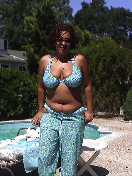 14P Buxom brunette amateur in the pool
