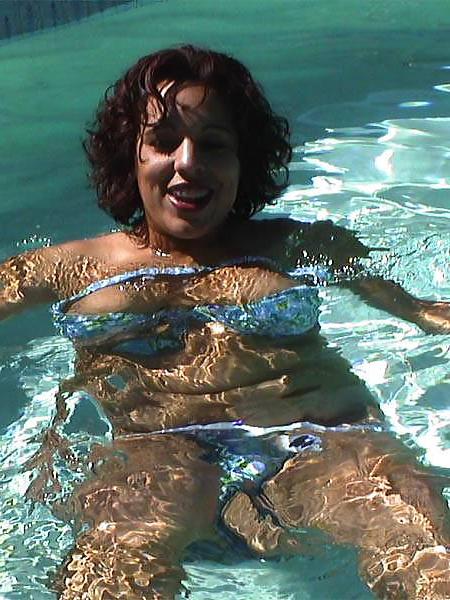 14P Buxom brunette amateur in the pool