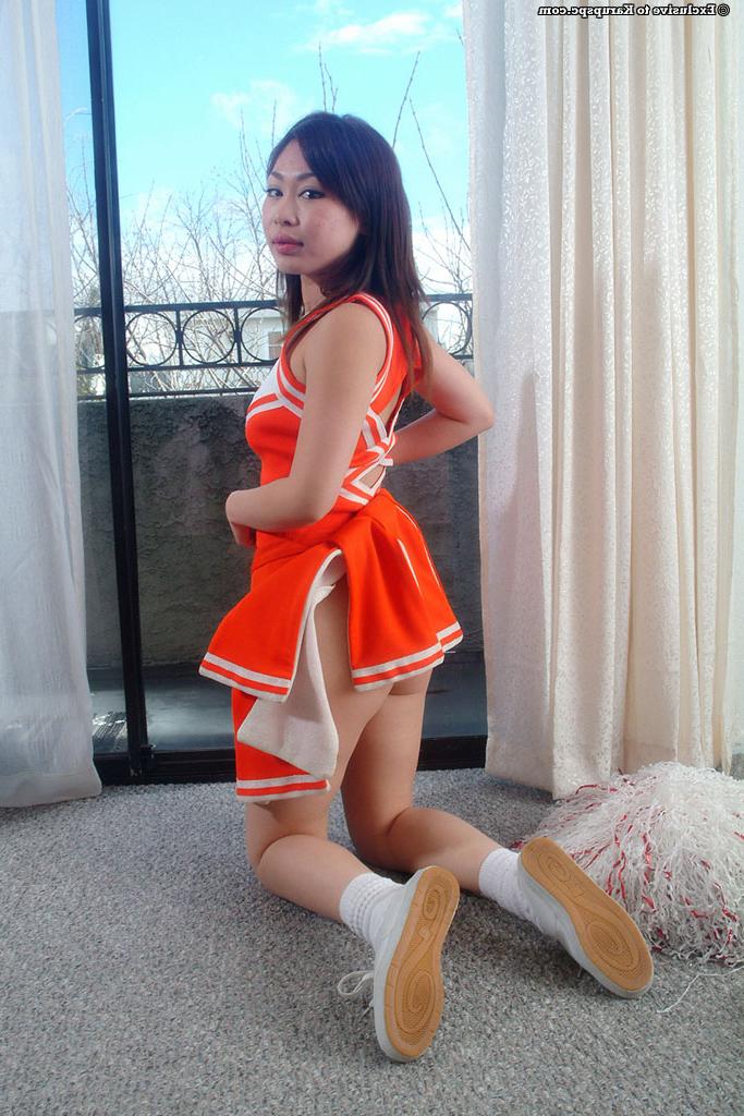 16P Asian teen Yumi takes part in an amateur posing scene in uniform