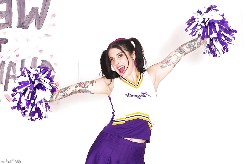 15P Amateur upskirt posing with a hot babe Joanna Angel in her cheerleader suit